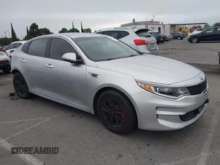 2018 Kia Optima S with VIN 5XXGT4L35JG216039, listed as a IAAI auction lot 42451216 with 91,679 mi miles and . Bid and sale history available at DreamBid. Image 1.