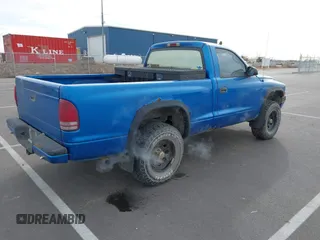 1999 Dodge Dakota with VIN 1B7GG26X5XS296142, listed as a IAAI auction lot 41486667 with 185,436 mi miles and . Bid and sale history available at carsss.com. Image 4.