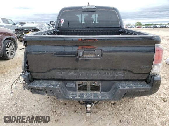 2021 Toyota Tacoma SR z VIN 5TFCZ5AN1MX256607, wystawiony jako Copart lot #52182225 z przebiegiem 44 717 mil mil oraz Szkoda całkowita • Salvage title. Historia ofert i sprzedaży dostępna na DreamBid. Obrazek 6.