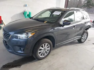 2016 Mazda CX-5 Touring with VIN JM3KE4CY4G0779827, listed as a IAAI auction lot 41840727 with 91,367 mi miles. Bid and sale history available at carsss.com. Image 18.