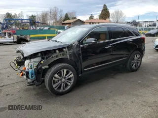2020 Cadillac XT5 Premium Luxury AWD with VIN 1GYKNDRS7LZ107952, listed as a Copart auction lot 50339045 with 63,131 mi miles and Salvage Title. Bid and sale history available at DreamBid. Image 1.