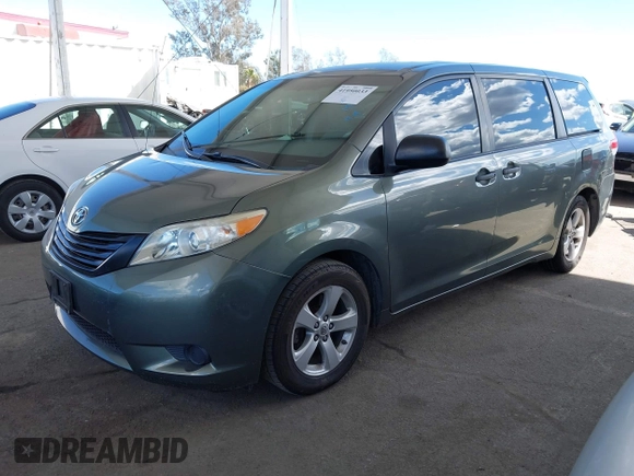 2014 Toyota Sienna L with VIN 5TDZK3DC6ES441417, listed as a IAAI auction lot 41950033 with 170,804 mi miles. Bid and sale history available at carsss.com. Image 2.