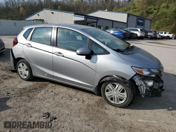 2019 Honda Fit LX z VIN 3HGGK5H41KM712693, wystawiony jako Copart lot #52069275 z przebiegiem 68 522 mil mil oraz Szkoda całkowita • Salvage title. Historia ofert i sprzedaży dostępna na DreamBid. Obrazek 4.