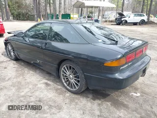 1995 Ford Probe z VIN 1ZVLT22B1S5104093, wystawiony jako IAAI lot #41744654 z przebiegiem 166 253 mil mil oraz . Historia ofert i sprzedaży dostępna na DreamBid. Obrazek 3.
