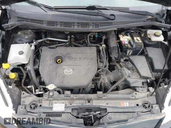 2015 Mazda 5 Sport with VIN JM1CW2BL2F0190990, listed as a IAAI auction lot 42532210 with 98,528 mi miles and . Bid and sale history available at DreamBid. Image 10.