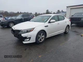 2015 Kia Optima LX with VIN KNAGM4A70F5571034, listed as a IAAI auction lot 41734211 with 214,948 mi miles. Bid and sale history available at carsss.com. Image 18.