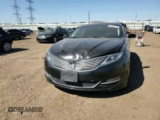 2015 Lincoln MKZ z VIN 3LN6L2GK1FR613074, wystawiony jako Copart lot #52157775 z przebiegiem 118 144 mil mil oraz Szkoda całkowita • Salvage title. Historia ofert i sprzedaży dostępna na DreamBid. Obrazek 10.