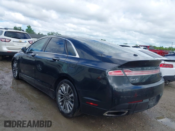 2015 Lincoln MKZ z VIN 3LN6L2G99FR625258, wystawiony jako IAAI lot #42308188 z przebiegiem 186 911 mil mil oraz . Historia ofert i sprzedaży dostępna na DreamBid. Obrazek 3.