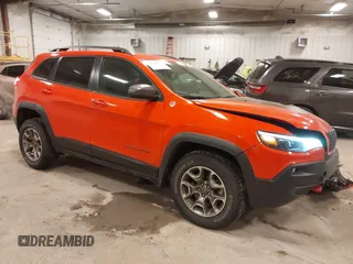 2021 Jeep Cherokee Trailhawk z VIN 1C4PJMBX2MD236855, wystawiony jako IAAI lot #41254855 z przebiegiem 18 452 mil mil oraz . Historia ofert i sprzedaży dostępna na DreamBid. Obrazek 1.