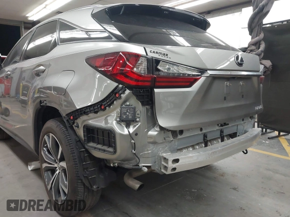 2022 Lexus RX 350 with VIN 2T2HZMAA6NC232022, listed as a IAAI auction lot 42528304 with 22,576 mi miles and . Bid and sale history available at DreamBid. Image 6.