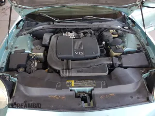 2002 Ford Thunderbird Hardtop Premium z VIN 1FAHP60A22Y109399, wystawiony jako Copart lot #61760324 z przebiegiem 137 158 mil mil oraz Szkoda całkowita • Salvage title. Historia ofert i sprzedaży dostępna na DreamBid. Obrazek 11.