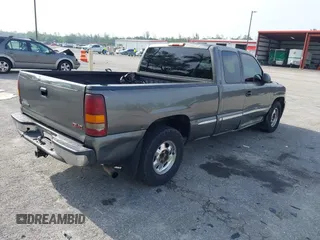 2001 GMC Sierra 1500 SLE with VIN 2GTEC19T911230691, listed as a IAAI auction lot 42367210 with 381,719 mi miles and . Bid and sale history available at DreamBid. Image 4.