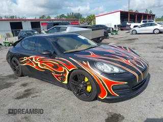 2011 Porsche Panamera S z VIN WP0AB2A7XBL062934, wystawiony jako IAAI lot #42342981 z przebiegiem 70 479 mil mil oraz . Historia ofert i sprzedaży dostępna na DreamBid. Obrazek 1.