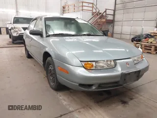2002 Saturn SL with VIN 1G8ZG52892Z185354, listed as a IAAI auction lot 42754044 with 210,412 mi miles and . Bid and sale history available at DreamBid. Image 1.