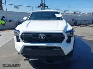 2024 Toyota Tacoma 4WD SR5 with VIN 3TMLB5JN1RM050446, listed as a IAAI auction lot 41658922 with 9,369 mi miles. Bid and sale history available at carsss.com. Image 12.