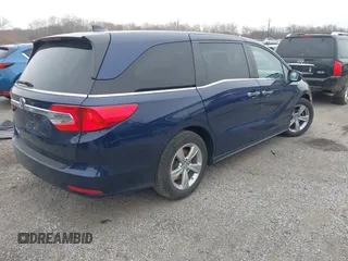 2020 Honda Odyssey EX-L with VIN 5FNRL6H70LB055122, listed as a IAAI auction lot 41620219 with 129,582 mi miles. Bid and sale history available at carsss.com. Image 4.