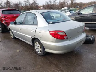 2001 Kia Rio with VIN KNADC123716042067, listed as a IAAI auction lot 41449479 with 113,108 mi miles. Bid and sale history available at carsss.com. Image 3.