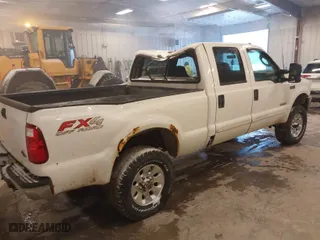2003 Ford Super Duty F-350 SRW XL with VIN 1FTSW31P23EC17321, listed as a IAAI auction lot 41292702 with 114,178 mi miles. Bid and sale history available at carsss.com. Image 4.