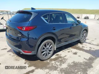 2018 Mazda CX-5 Grand Touring с VIN JM3KFBDM6J0326684, выставлен на аукционе IAAI как лот 42087646 с пробегом 111 192 миль миль и . История ставок и продаж доступна на DreamBid. Изображение 4.