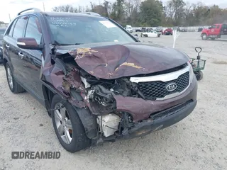 2013 Kia Sorento EX with VIN 5XYKU4A21DG312753, listed as a IAAI auction lot 41033124 with 197,459 mi miles and . Bid and sale history available at carsss.com. Image 6.