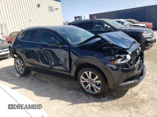 2023 Mazda CX-30 S Carbon Edition with VIN 3MVDMBCMXPM539683, listed as a Copart auction lot 48186175 with 22,750 mi miles and Non repairable. Bid and sale history available at DreamBid. Image 4.