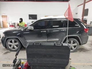 2011 Jeep Grand Cherokee Overland with VIN 1J4RR6GTXBC701186, listed as a IAAI auction lot 41553697 with 172,317 mi miles. Bid and sale history available at carsss.com. Image 14.