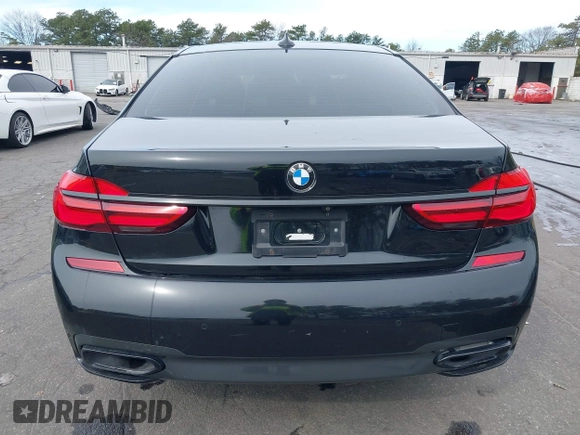 2019 BMW 7 Series 740i with VIN WBA7E2C57KB217973, listed as a IAAI auction lot 39064321 with 54,818 mi miles and . Bid and sale history available at DreamBid. Image 16.