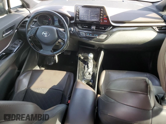 2019 Toyota C-HR XLE z VIN JTNKHMBX9K1016158, wystawiony jako Copart lot #54121995 z przebiegiem 119 716 mil mil oraz Szkoda całkowita • Salvage title. Historia ofert i sprzedaży dostępna na DreamBid. Obrazek 8.