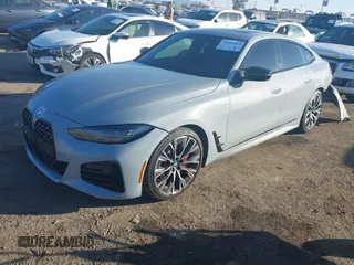 2023 BMW 4 Series M440i with VIN WBA63AW05PFP60184, listed as a IAAI auction lot 41045811 with 12,141 mi miles and . Bid and sale history available at DreamBid. Image 2.