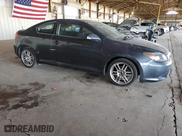 2005 Scion tC with VIN JTKDE177950027533, listed as a Copart auction lot 54366975 with 179,693 mi miles and Salvage Title. Bid and sale history available at carsss.com. Image 4.