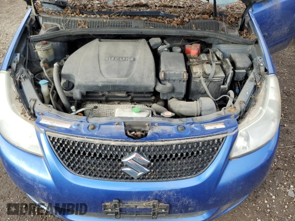 2012 Suzuki SX4 LE with VIN JS2YC5A35C6303573, listed as a Copart auction lot 84844564 with 0 mi miles and Clean Title. Bid and sale history available at carsss.com. Image 11.