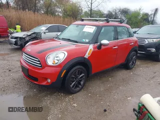 2014 MINI Countryman with VIN WMWZB3C53EWM32495, listed as a IAAI auction lot 41949096 with 161,524 mi miles and . Bid and sale history available at DreamBid. Image 2.