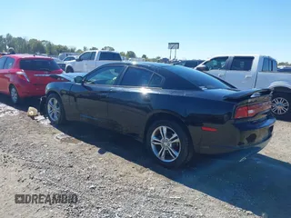 2013 Dodge Charger RT Plus with VIN 2C3CDXDT6DH567009, listed as a IAAI auction lot 40619931 with 145,015 mi miles. Bid and sale history available at carsss.com. Image 3.
