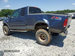 2002 Ford F-150 XL with VIN 1FTRX18L82NB06824, listed as a Copart auction lot 57342315 with 207,390 mi miles and Salvage title. Bid and sale history available at DreamBid. Image 2.
