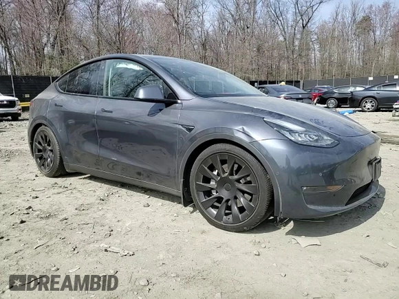 2022 Tesla Model Y Long Range with VIN 7SAYGDEE5NF366493, listed as a Copart auction lot 49874975 with 66,925 mi miles and Salvage Title. Bid and sale history available at DreamBid. Image 10.