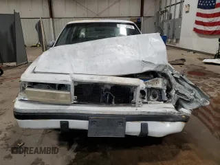 1992 Dodge Dynasty LE z VIN 1B3XC56RXND822802, wystawiony jako Copart lot #82799714 z przebiegiem 137 131 mil mil oraz Szkoda całkowita • Salvage title. Historia ofert i sprzedaży dostępna na DreamBid. Obrazek 5.