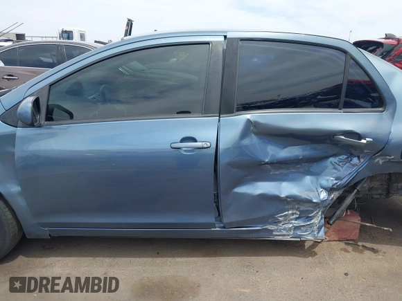 2012 Toyota Yaris with VIN JTDBT4K34CL030720, listed as a IAAI auction lot 42222397 with 252,669 mi miles and . Bid and sale history available at DreamBid. Image 14.