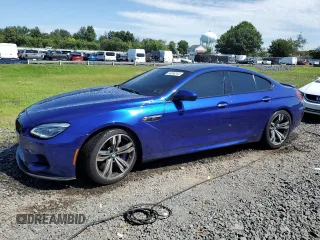 2016 BMW M6 z VIN WBS6E9C56GGF92508, wystawiony jako Copart lot #66958344 z przebiegiem Nie podano mil oraz Szkody całkowita. Historia ofert i sprzedaży dostępna na DreamBid. Obrazek 1.