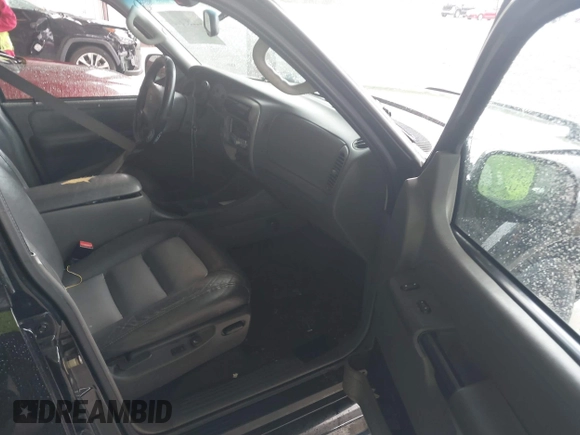2004 Ford Explorer Sport Trac XLS z VIN 1FMZU77K94UA82414, wystawiony jako IAAI lot #42253012 z przebiegiem 202 018 mil mil oraz . Historia ofert i sprzedaży dostępna na DreamBid. Obrazek 5.