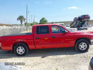 2000 Dodge Dakota Sport with VIN 1B7GL2AX0YS685498, listed as a IAAI auction lot 42069753 with 56,269 mi miles and . Bid and sale history available at DreamBid. Image 13.