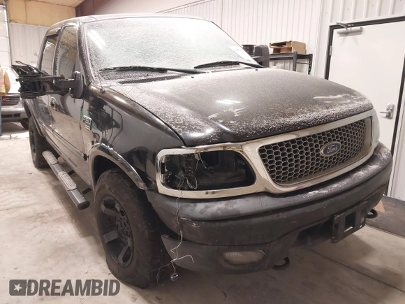 2002 Ford F-150 XLT with VIN 1FTRW08L62KC00490, listed as a IAAI auction lot 41380406 with 192,013 mi miles. Bid and sale history available at carsss.com. Image 6.