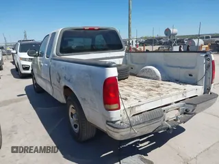 2002 Ford F-150 XL with VIN 1FTRX17232NA78925, listed as a IAAI auction lot 41851582 with 43 mi miles. Bid and sale history available at carsss.com. Image 3.