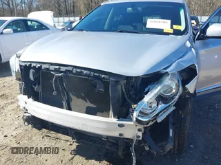 2013 Infiniti JX35 with VIN 5N1AL0MM3DC336945, listed as a IAAI auction lot 41858705 with 114,784 mi miles. Bid and sale history available at carsss.com. Image 6.