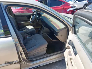 1998 Buick Regal LS with VIN 2G4WB52KXW1479844, listed as a IAAI auction lot 42093566 with 1 mi miles. Bid and sale history available at carsss.com. Image 5.