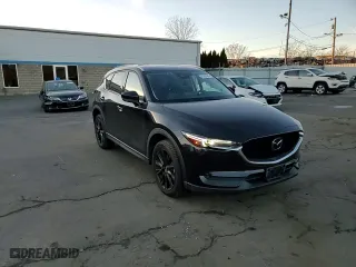 2021 Mazda CX-5 Grand Touring Reserve with VIN JM3KFBAY6M0309783, listed as a Copart auction lot 43549305 with 73,124 mi miles and Salvage Title. Bid and sale history available at carsss.com. Image 10.