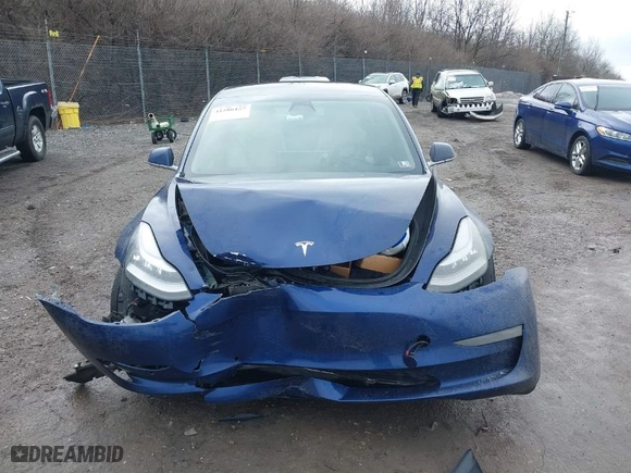 2019 Tesla Model 3 Mid Range with VIN 5YJ3E1EA6KF332812, listed as a IAAI auction lot 41586157 with 80,230 mi miles. Bid and sale history available at carsss.com. Image 12.