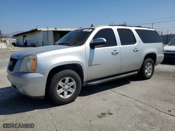2011 GMC Yukon XL SLT with VIN 1GKS1KE04BR322220, listed as a Copart auction lot 73423994 with 165,506 mi miles and Salvage Title. Bid and sale history available at carsss.com. Image 1.
