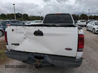 2003 Ford F-150 XL with VIN 1FTRF17W03NA02988, listed as a Copart auction lot 77209084 with Not Provided miles and Salvage Title. Bid and sale history available at DreamBid. Image 10.