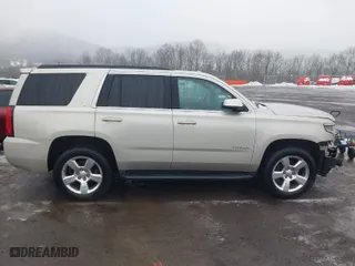 2016 Chevrolet Tahoe LT with VIN 1GNSKBKC7GR196148, listed as a IAAI auction lot 41569740 with 141,638 mi miles. Bid and sale history available at carsss.com. Image 13.