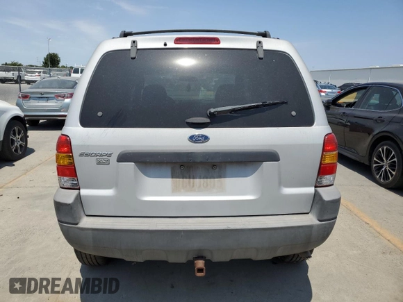 2002 Ford Escape XLT z VIN 1FMCU03152KC58829, wystawiony jako Copart lot #61541644 z przebiegiem Nie podano mil oraz Czysty tytuł • Clean title. Historia ofert i sprzedaży dostępna na DreamBid. Obrazek 6.